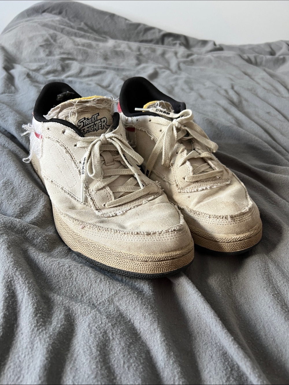 Reebok Street Fighter sneaker- Men’s Low-Top Canvas in cream with red highlights